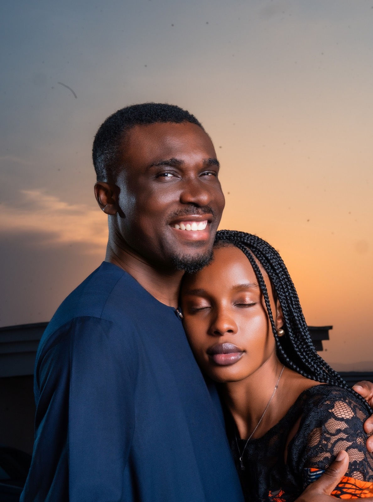 Couple embracing at dusk