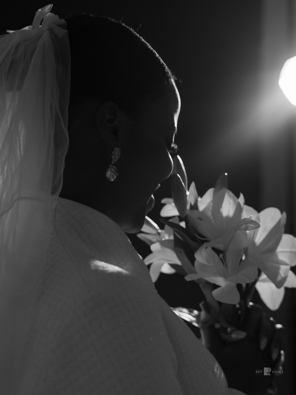 Couple in a dimly lit studio