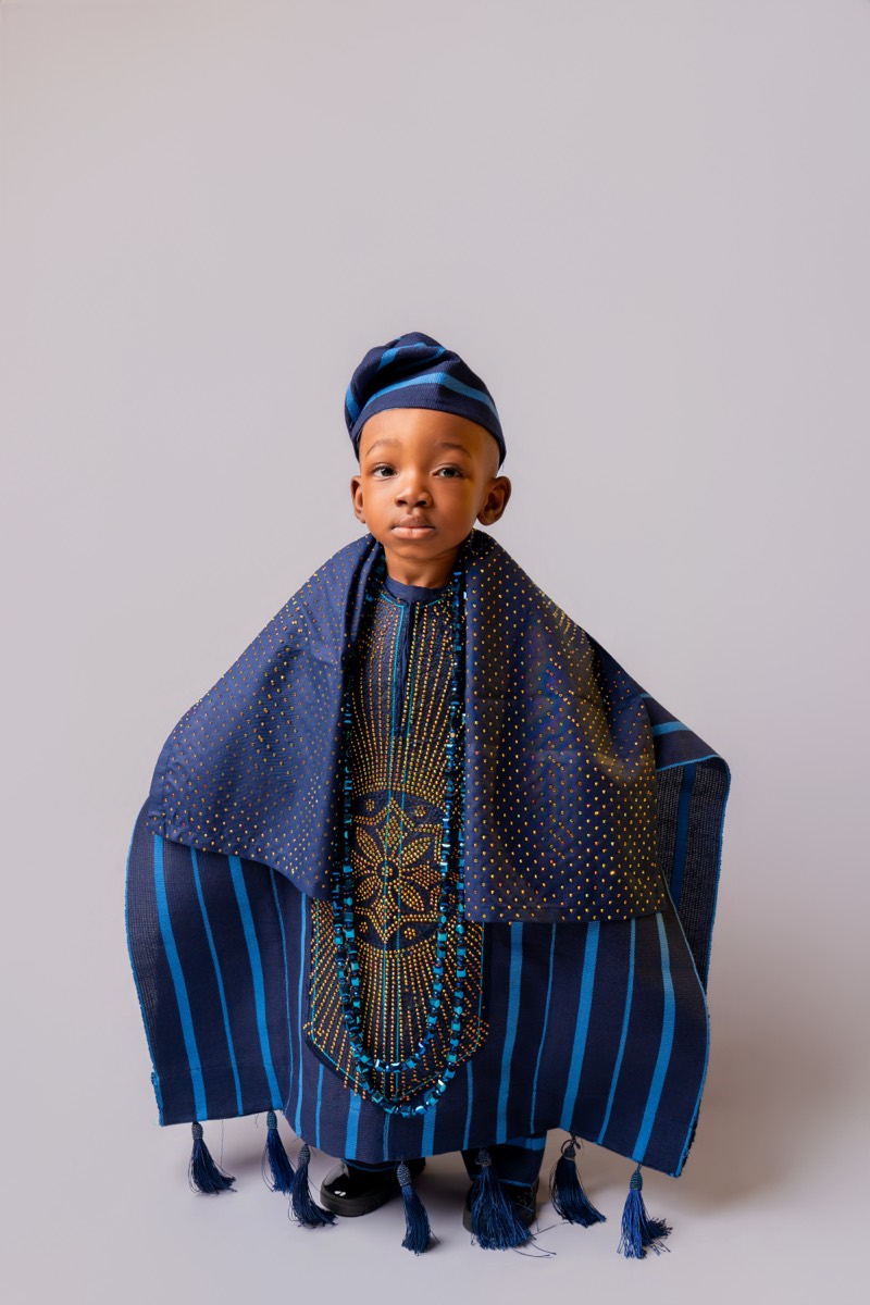 Young boy in a blue agbada